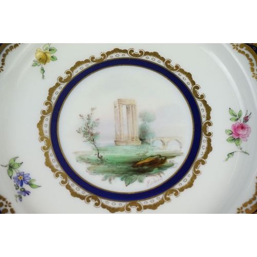 29 - Early 20th century Royal Worcester Cabinet Plate with a hand painted scene of ruins within a blue an... 