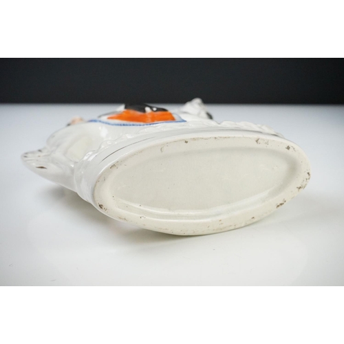 32 - Pair of 19th century Staffordshire Flatback Figures titled ' War ' and ' Peace ' modelled as a Soldi... 