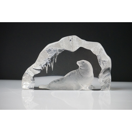 36 - Seven Glass Paperweights including Mats Jonasson ' Seal ', Caithness ' Pink Champagne ', two Bubble ... 