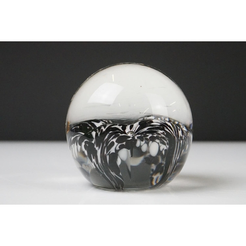 36 - Seven Glass Paperweights including Mats Jonasson ' Seal ', Caithness ' Pink Champagne ', two Bubble ... 