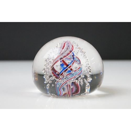 36 - Seven Glass Paperweights including Mats Jonasson ' Seal ', Caithness ' Pink Champagne ', two Bubble ... 