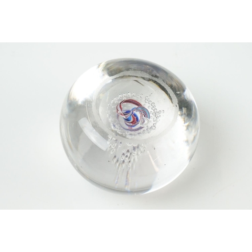 36 - Seven Glass Paperweights including Mats Jonasson ' Seal ', Caithness ' Pink Champagne ', two Bubble ... 