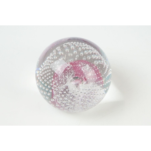 36 - Seven Glass Paperweights including Mats Jonasson ' Seal ', Caithness ' Pink Champagne ', two Bubble ... 