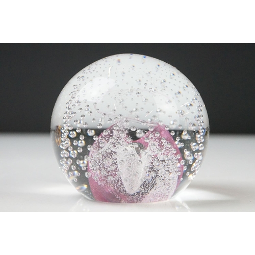 36 - Seven Glass Paperweights including Mats Jonasson ' Seal ', Caithness ' Pink Champagne ', two Bubble ... 