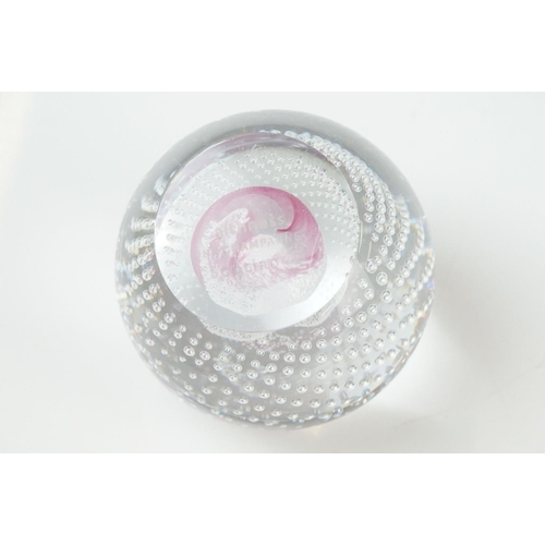 36 - Seven Glass Paperweights including Mats Jonasson ' Seal ', Caithness ' Pink Champagne ', two Bubble ... 
