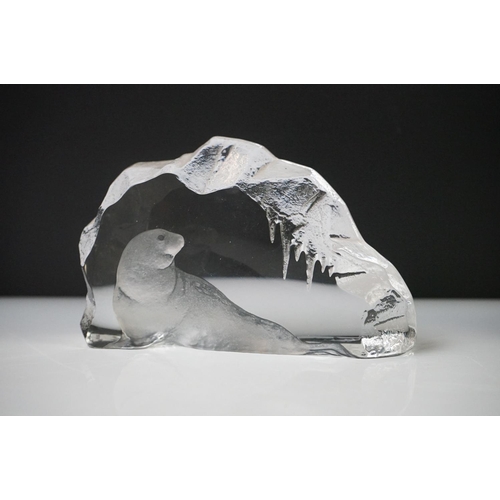 36 - Seven Glass Paperweights including Mats Jonasson ' Seal ', Caithness ' Pink Champagne ', two Bubble ... 