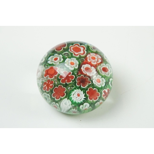 36 - Seven Glass Paperweights including Mats Jonasson ' Seal ', Caithness ' Pink Champagne ', two Bubble ... 