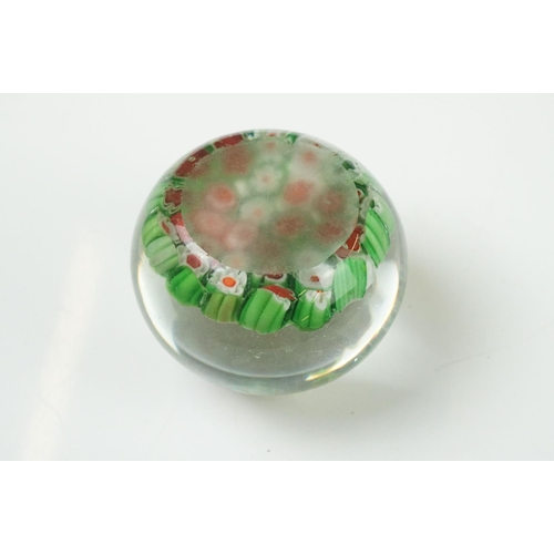 36 - Seven Glass Paperweights including Mats Jonasson ' Seal ', Caithness ' Pink Champagne ', two Bubble ... 