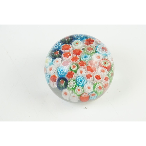 36 - Seven Glass Paperweights including Mats Jonasson ' Seal ', Caithness ' Pink Champagne ', two Bubble ... 