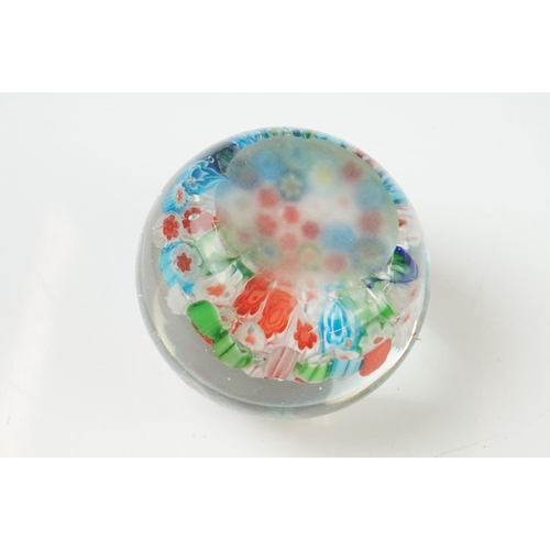 36 - Seven Glass Paperweights including Mats Jonasson ' Seal ', Caithness ' Pink Champagne ', two Bubble ... 