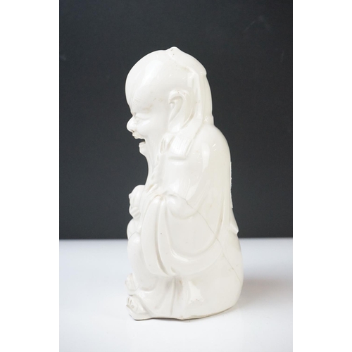 41 - Chinese Blanc de Chine Ceramic Figure of a Seated Elder, 18cm high together with Hardwood Carved Chi... 