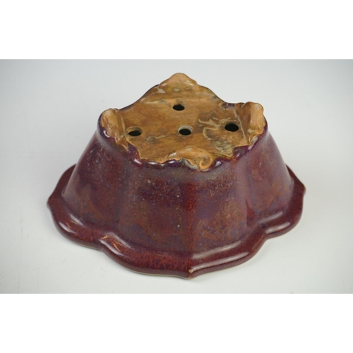 46 - Chinese Jun type Quatrefoil Planter and Stand, the exterior with a purple tone glaze and the interio... 