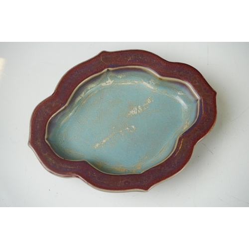 46 - Chinese Jun type Quatrefoil Planter and Stand, the exterior with a purple tone glaze and the interio... 