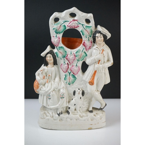 47 - 19th century Staffordshire Pottery Watch Holder with a musician lady holding a sheep and a spaniel, ... 