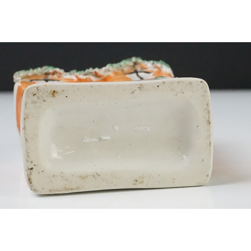 47 - 19th century Staffordshire Pottery Watch Holder with a musician lady holding a sheep and a spaniel, ... 