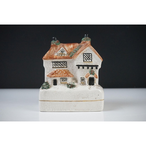 47 - 19th century Staffordshire Pottery Watch Holder with a musician lady holding a sheep and a spaniel, ... 