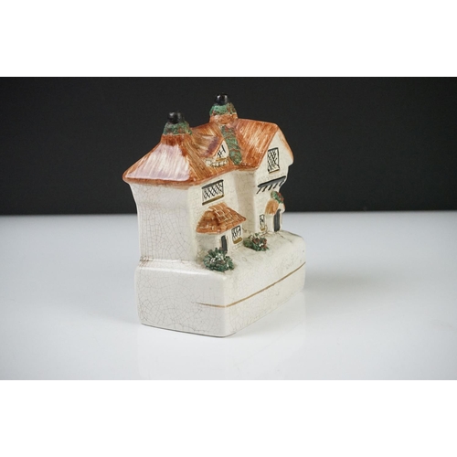 47 - 19th century Staffordshire Pottery Watch Holder with a musician lady holding a sheep and a spaniel, ... 