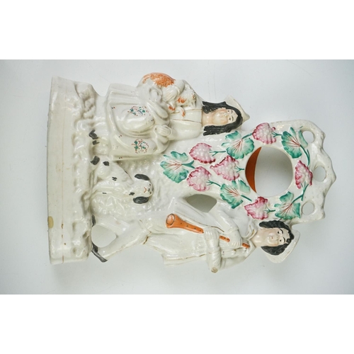 47 - 19th century Staffordshire Pottery Watch Holder with a musician lady holding a sheep and a spaniel, ... 
