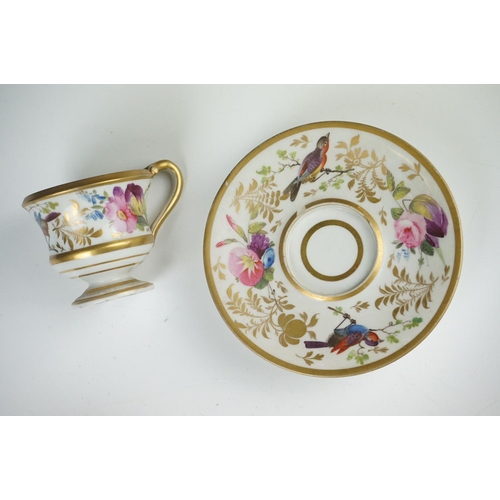 53 - Pair of Continental Porcelain Cabinet Cups and Saucers decorated in gilt and enamels with flowers an... 