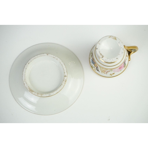 53 - Pair of Continental Porcelain Cabinet Cups and Saucers decorated in gilt and enamels with flowers an... 