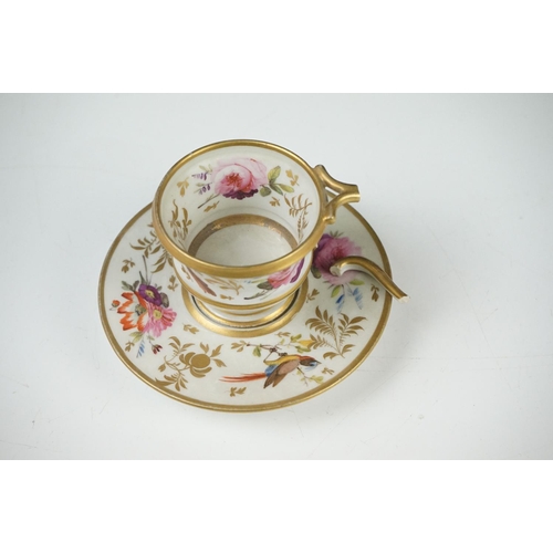 53 - Pair of Continental Porcelain Cabinet Cups and Saucers decorated in gilt and enamels with flowers an... 