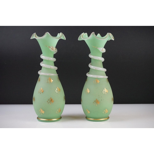 55 - Pair of Trumpet Shape Green Glass Vases, the necks with applied pale green glass entwined snakes, 27... 