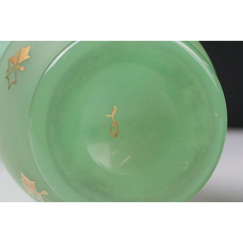 55 - Pair of Trumpet Shape Green Glass Vases, the necks with applied pale green glass entwined snakes, 27... 