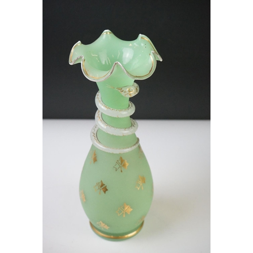 55 - Pair of Trumpet Shape Green Glass Vases, the necks with applied pale green glass entwined snakes, 27... 