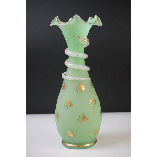 55 - Pair of Trumpet Shape Green Glass Vases, the necks with applied pale green glass entwined snakes, 27... 