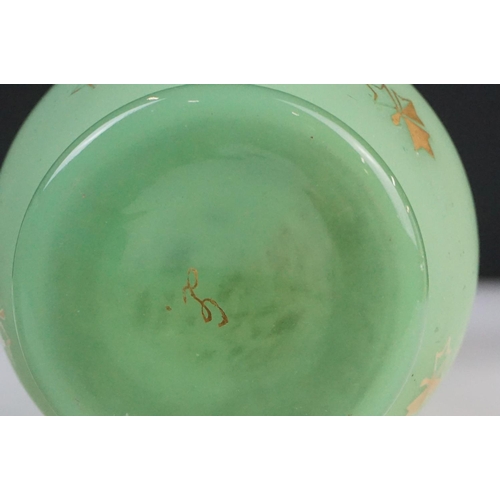 55 - Pair of Trumpet Shape Green Glass Vases, the necks with applied pale green glass entwined snakes, 27... 