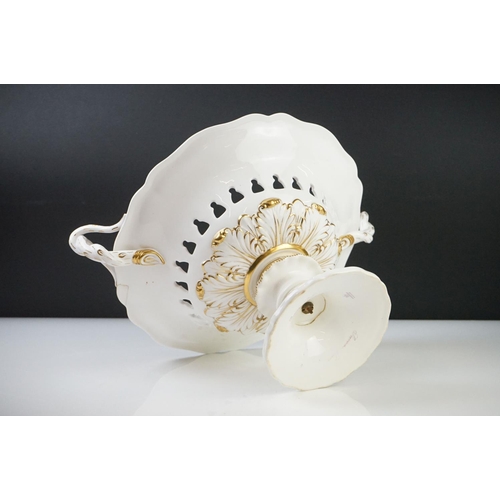 56 - 19th century Davenport Longport Footed Comport decorated with flowers, 23cm high together with Blanc... 