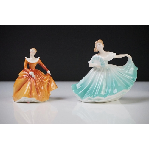 57 - Eleven Royal Doulton Figurines including Christmas Morn HN3212, Emma HN3208, Esmeralda HN2168, Fragr... 