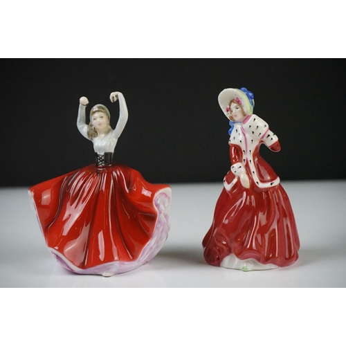 57 - Eleven Royal Doulton Figurines including Christmas Morn HN3212, Emma HN3208, Esmeralda HN2168, Fragr... 
