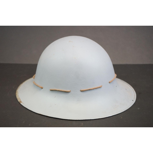 75 - A World War Two Allied Forces Overpainted Steel Helmet Complete With Liner.