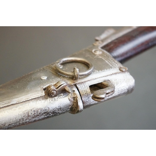 160 - An Early 19th Century Indian Matchlock Rifle With White Metal Furniture.