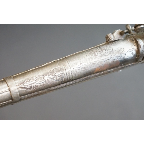 160 - An Early 19th Century Indian Matchlock Rifle With White Metal Furniture.