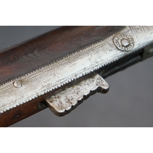 160 - An Early 19th Century Indian Matchlock Rifle With White Metal Furniture.