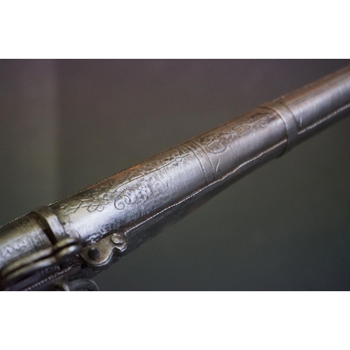 160 - An Early 19th Century Indian Matchlock Rifle With White Metal Furniture.