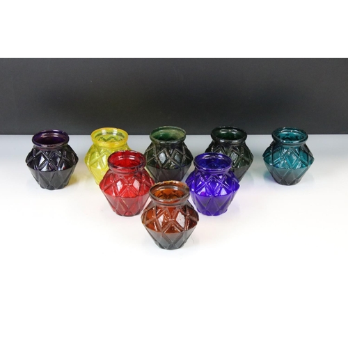 100 - Set of Eight Victorian Moulded Glass Tea Light Holders of varying colours, with geometric diamond-sh... 