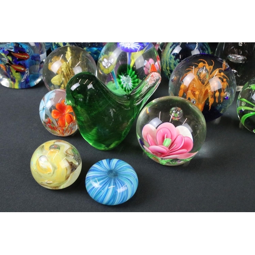 124 - Collection of over 45 glass paperweights featuring 2 x Mdina examples (signed 'Mdina' to base), Ferr... 