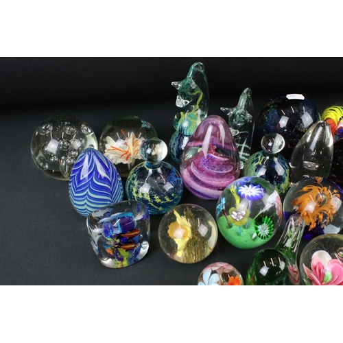 124 - Collection of over 45 glass paperweights featuring 2 x Mdina examples (signed 'Mdina' to base), Ferr... 