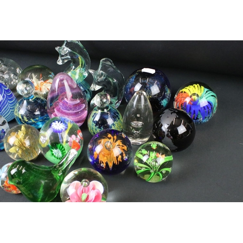 124 - Collection of over 45 glass paperweights featuring 2 x Mdina examples (signed 'Mdina' to base), Ferr... 