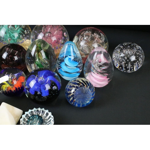 122 - Large Collection of over 70 glass paperweights in a variety of colours and sizes, featuring millefio... 