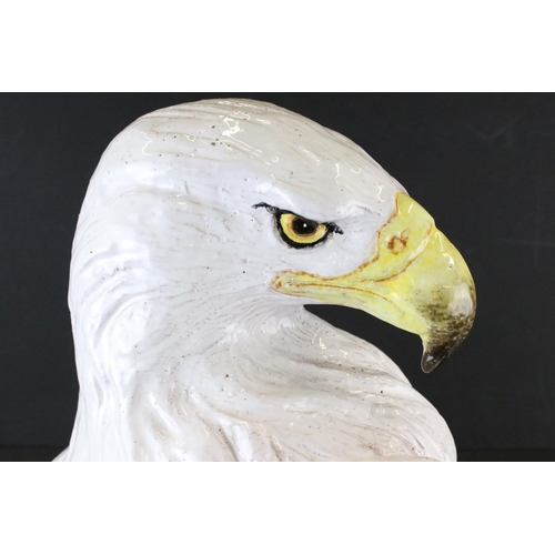 128 - Large Ceramic Model of a White Eagle perched on a stump, measures approx 72cm high