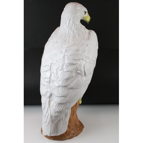 128 - Large Ceramic Model of a White Eagle perched on a stump, measures approx 72cm high