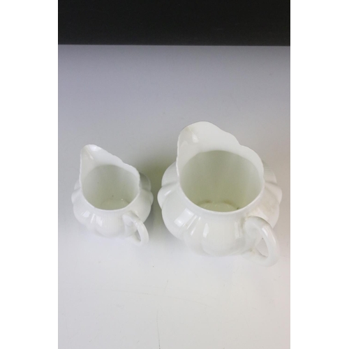 131 - Shelley & Foley Dainty White Tea Wares of moulded lobed form, with leaf decoration (Shelley reg no. ... 