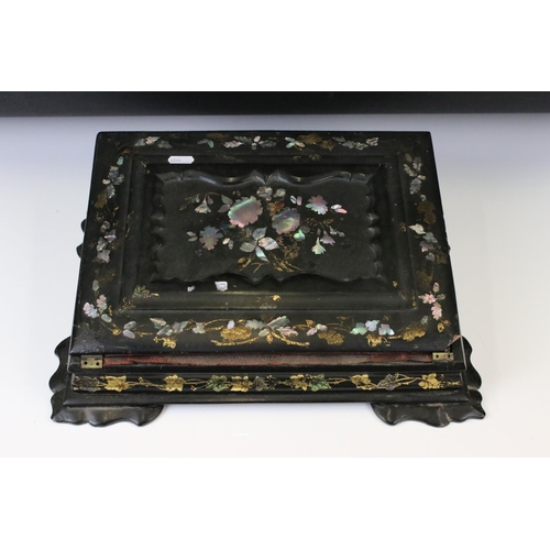 187 - Victorian black lacquered writing slope with abalone shell floral inlay to the hinged lid, gilt pain... 