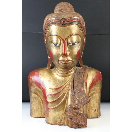 190 - Large South East Asian / Thai Wooden Buddha with a gilded and red lacquered finish, 56cm high