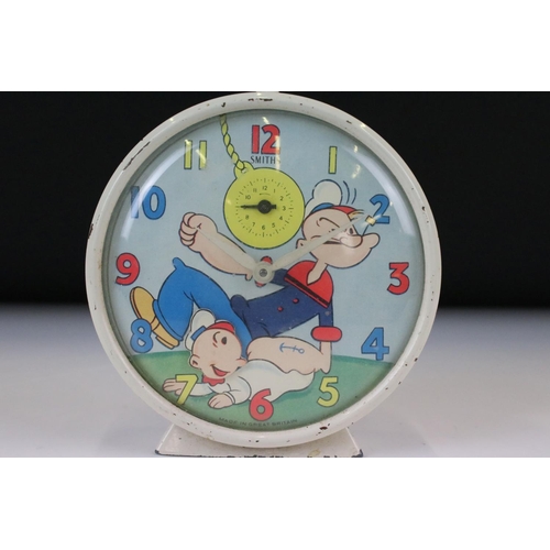 154 - Mid 20th Century Smiths Popeye Alarm Clock, with cream enamel case, measures 11cm W x 12cm H