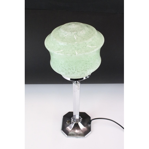 157 - Art Deco chrome table lamp with mottled green glass shade, above a hexagonal column on an octagonal ... 